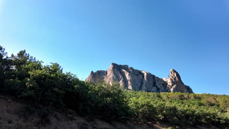 A-scenic-view-of-the-mountains-in-Sudak,-Crimea,-Russia,-with-a-clear-blue-sky-overhead