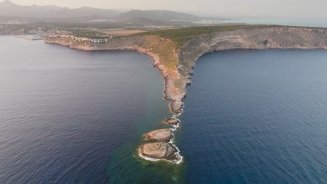 Aerial-Panorama-Of-Punta-De-El-Toro-Narrow-Rock-Formation,-Mallorca