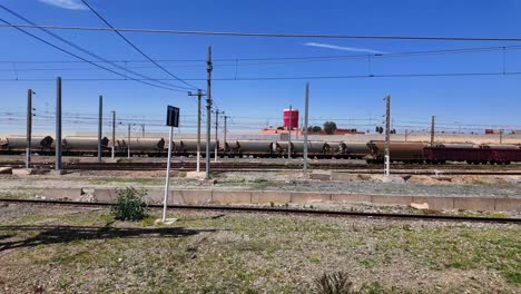 Passing-by-rail-in-industrial-hub-Morocco,-between-Marrakesh,-Casablanca