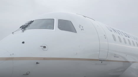 Still-shot-of-cockpit-exterior-airplane-waiting-on-the-airport-tarmac