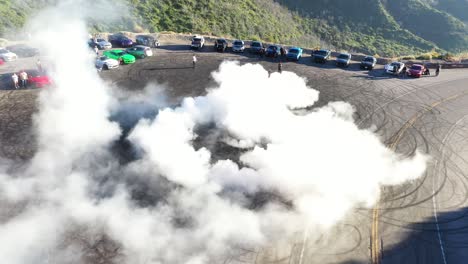 Done-shot-of-muscle-and-sports-cars-doing-doughnuts-and-burnouts-with-a-car-club-in-the-Angeles-National-Forest-in-Southern-California