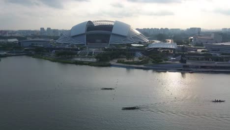 Aerial-drone-shot-of-Singapore-Indoor-Stadium-during-sunrise