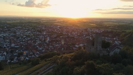 Ascending-behind-fascinating-historic-Strahlenburg-castle-in-Schriesheim-Germany-during-sunset