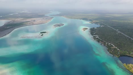 Aerial-view-of-beautiful-torquoise-blue-Lake-Bacalar-in-Mexico