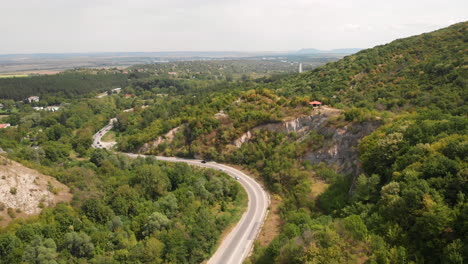 Aerial-view-shot-from-drone-over-Bulgarian-road-passing-though-the-Balkan-mountains