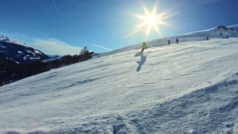 Scenic-view-of-a-slope-with-winter-sport-enthusiasts