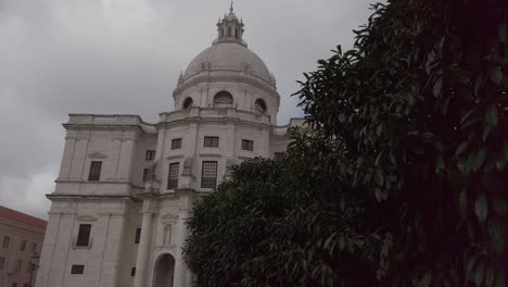 Sliding-shot-of-Santa-Engracia-church-in-Lisbon,-Portugal,-on-a-cloudy-day