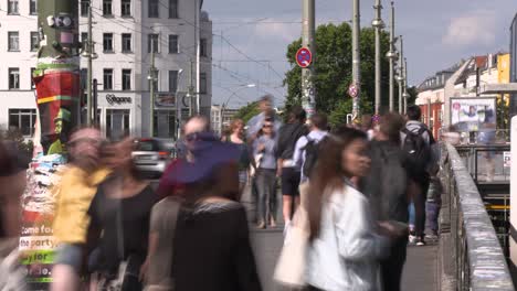 Timelapse:-Pedestrians-in-a-hurry-on-Warschauer-Bridge-in-Berlin-Friedrichshain