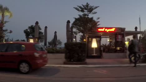 View-from-a-side-window-of-a-car-at-Kalamata-beach,-Greece