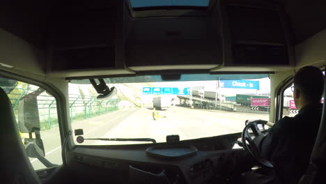 HGV-Driver-navigating-around-the-Port-Of-Dover,-UK