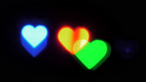 Beautiful-hearts-bokeh-from-flashing-lights,-Valentines-Day,-wedding-day-or-social-media-Like-background-concept