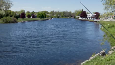 High-water-levels-on-AuSable-River-with-spring-flooding-in-Oscoda,-MI-USA