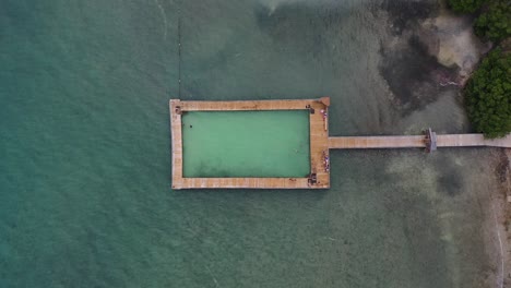 pool-in-the-ocean-aerial-playita-rosada-in-lajas,-puerto-rico