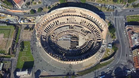 Helicopter-fly-over-Colosseum,-Rome-Italy