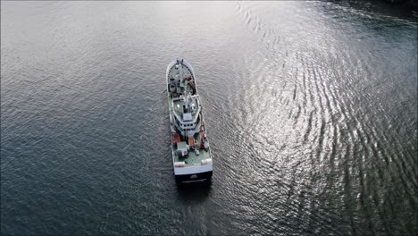 Large-trawler-fishing-ship-arrives-into-the-port-of-Bergen,-Norway