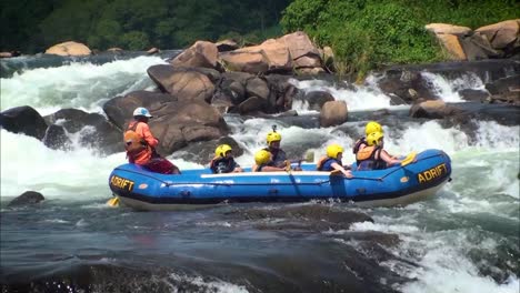 A-group-of-adventurous-people-enjoying-the-extreme-form-of-rafting-in-the-white-and-rough-waters-of-Nile-river