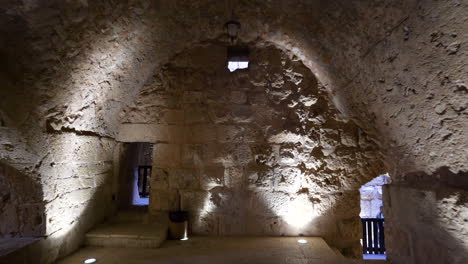 Stone-Walls-Cellar-With-Natural-Ambient-Light-and-High-Dome-Ceiling-in-the-Ruins-of-Kerak-Castle