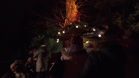 National-Trust-Chritsmas-Lights-at-night-crowd-queues-for-hot-drinks