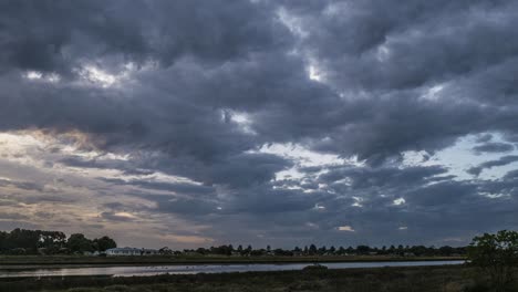 Timelapse-of-clouds-before-sunset-over-the-Moyne-River-in-Port-Fairy,-Victoria,-Australia