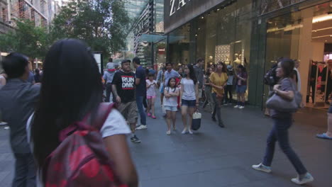 Handheld-walk-through-of-people-shopping-in-the-city-center-in-Sydney-Australia