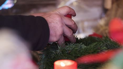 building-an-advent-wreath-on-a-christmas-market-Location:-Bolzano,-South-Tyrol,-Italy