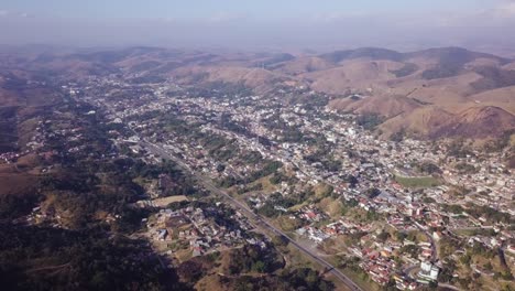 Wide-aerial-panning-shot,-municipality-of-Vassouras-in-Brazil,-Rio-de-Janeiro