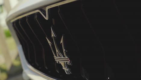 Tilt-shot-of-Maserati-front-sign