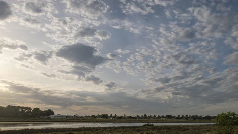 Timelapse-of-clouds-before-sunset-over-the-Moyne-River-in-Port-Fairy,-Victoria,-Australia