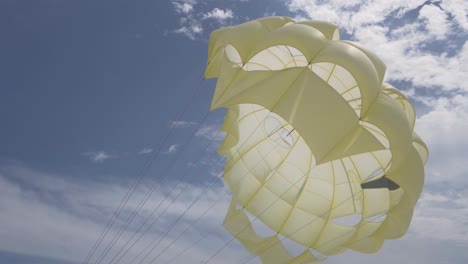 Parachute-flying-in-wind-with-blue-sky-at-Seaside