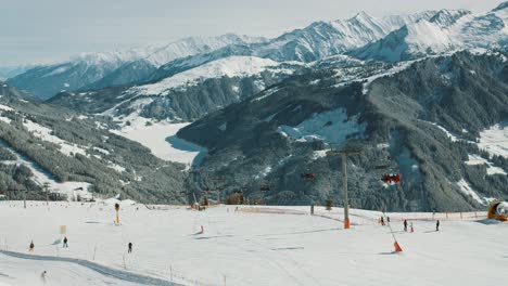 Time-lapse-of-winter-sports-slopes-with-people-skiing-and-snowboarding