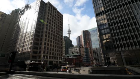 Downtown-Toronto,-Closeup-Of-CN-Tower-From-The-Financial-District