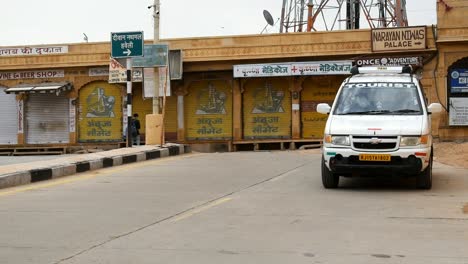 Two-vehicles-getting-down-the-hill-after-opening-of-Corona-viruscrisis-lock-down