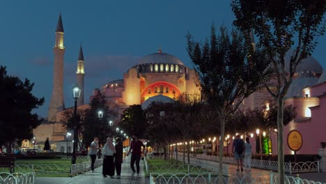 Night-clip-of-people-walking-near-an-illuminated-Hagia-Sophia-during-the-2020-Covid-pandemic