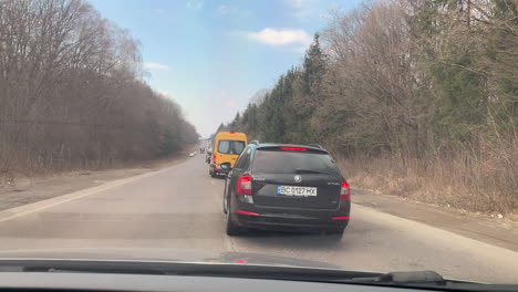 Police-pulling-a-car-over-at-a-security-checkpoint-outside-Lviv,-Ukraine-during-the-war-with-Russia