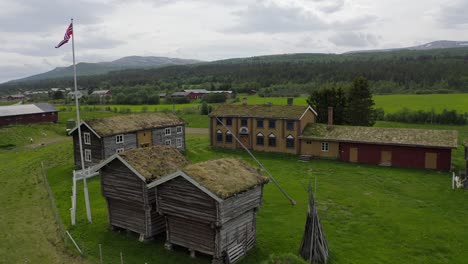 Aerial-view-over-norwegian-town-with-traditional-Norwegian-House-in-tynset-town-in-norway-in-summer-time-on-June-25,-2021