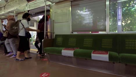 passengers-entering-and-leaving-the-commuter-line-during-the-corona-virus-pandemic