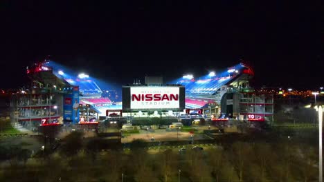 Rising-shot-revealing-Nissan-Stadium-at-night