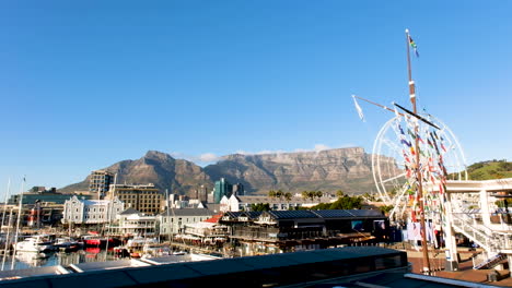 View-over-touristy-V-and-A-Waterfront---Cape-Wheel-and-Table-Mountain-visible