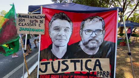 frontal-images-of-a-large-sign-with-the-photos-of-the-murdered-British-Dom-Phillips-and-the-Brazilian-Bruno-Pereira-both-killed-in-the-Amazon-of-brazil