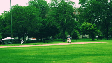 people-playing-baseball-on-a-field-in-chicago,-Illinois,-USA,-May-28,-2022