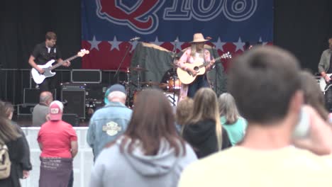 Taste-of-Madison-2022-Elizabeth-Mary-playing-with-the-crowd-in-the-foreground