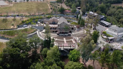 Aerial-view-away-from-the-empty-mountain-winery-in-California---pull-back,-drone-shot