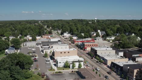 Whitehall,-Michigan-skyline-with-drone-video-at-an-angle-moving-forward