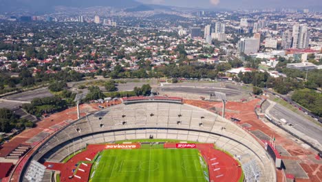 Estadio-Olimpico-Universitario-Stadium,-Mexico-City,-Aerial-Pull-Back-Hyperlapse