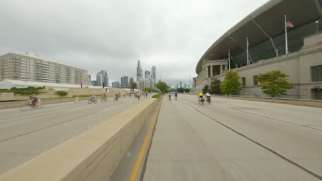 Chicago-cyclists-riding-northbound-on-DuSable-Lake-Shore-Drive-during-Bike-the-Drive-2022-soldier-field-and-museum-campus