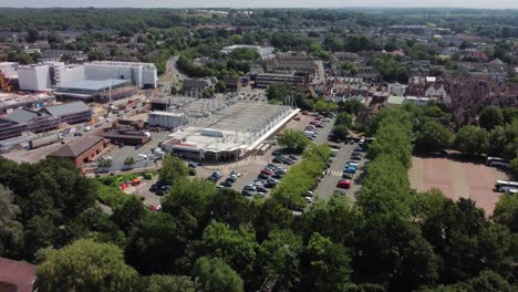 An-aerial-4K-view-of-a-supermarket-in-Canterbury,-Kent