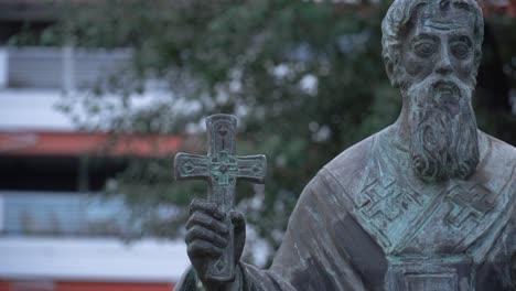 Close-up-of-Cyril-monument-holding-a-cross