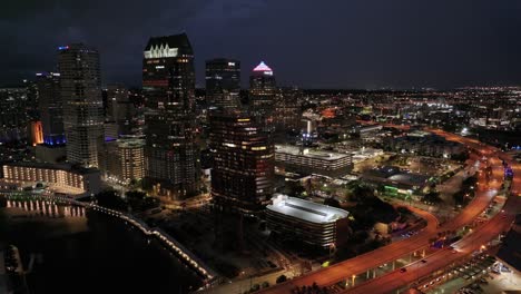 Aerial-establishing-shot-of-Tampa-Downtown-Skyline-at-night