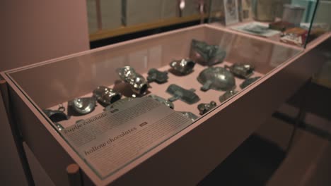 Display-case-featuring-vintage-hollow-chocolate-molds-and-information-at-Zagreb's-Chocolate-Museum