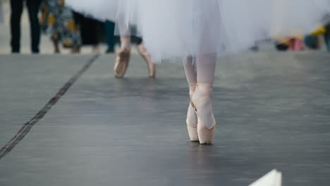 Close-up-of-ballet-dancer's-pointe-shoes-during-a-performance-at-Zagreb's-Cest-is-d'Best-street-festival